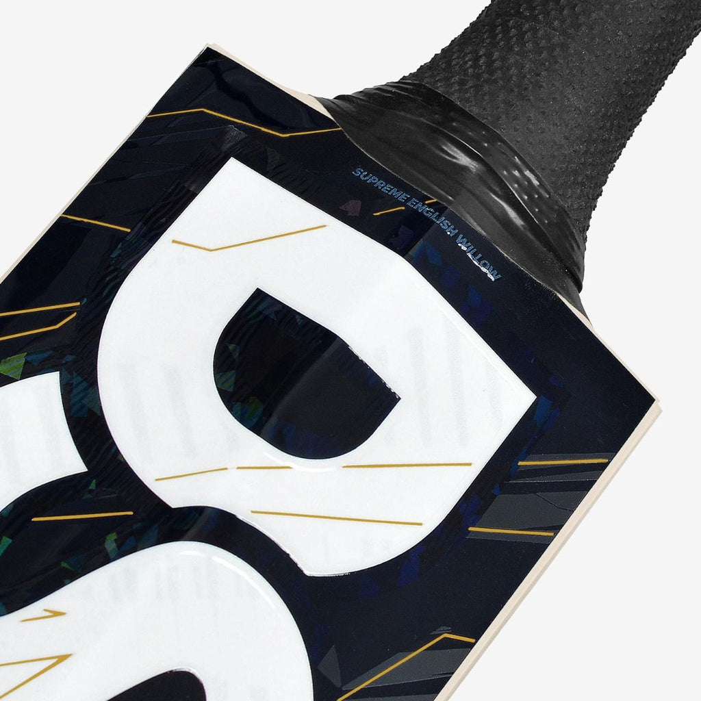 DSC Blak 111 cricket bat shoulder and handle close-up showing the black textured grip