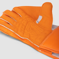 SG KLR 1 Blue/Orange wicketkeeping gloves, leather and cuff detail